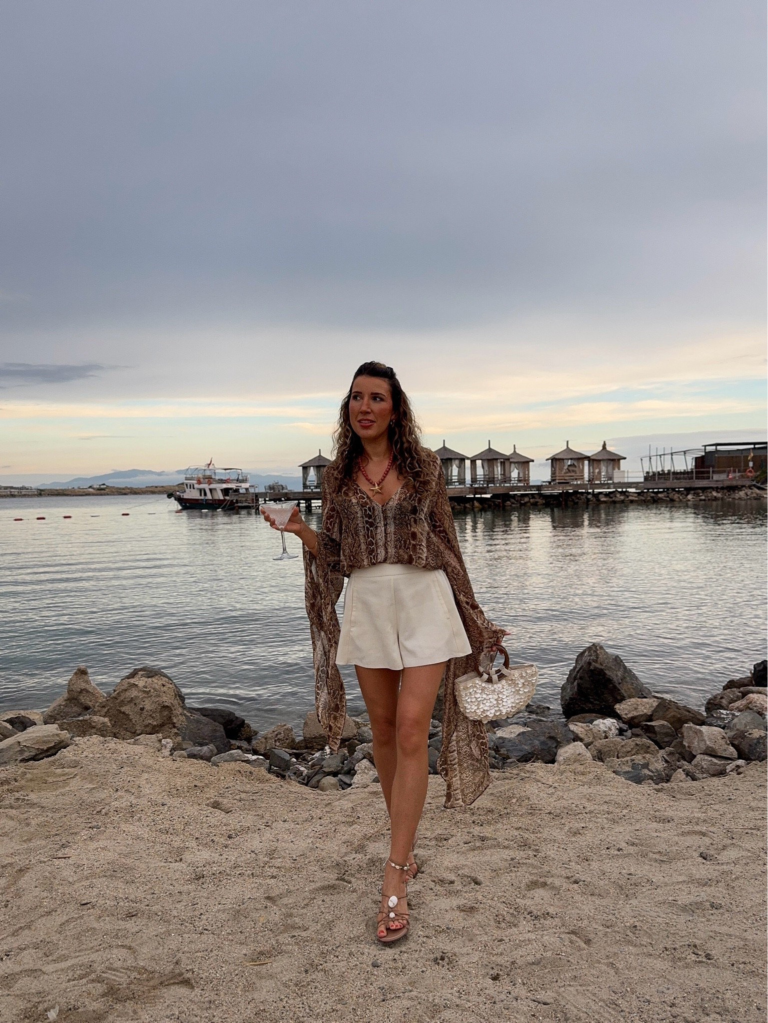 An outfit I wore on night two in Bodrum 🐚 it’s an animal print summer and I absolutely adore the sleeve detail on this snake print top. 

Holiday outfit , summer outfit ,

#LTKsummer