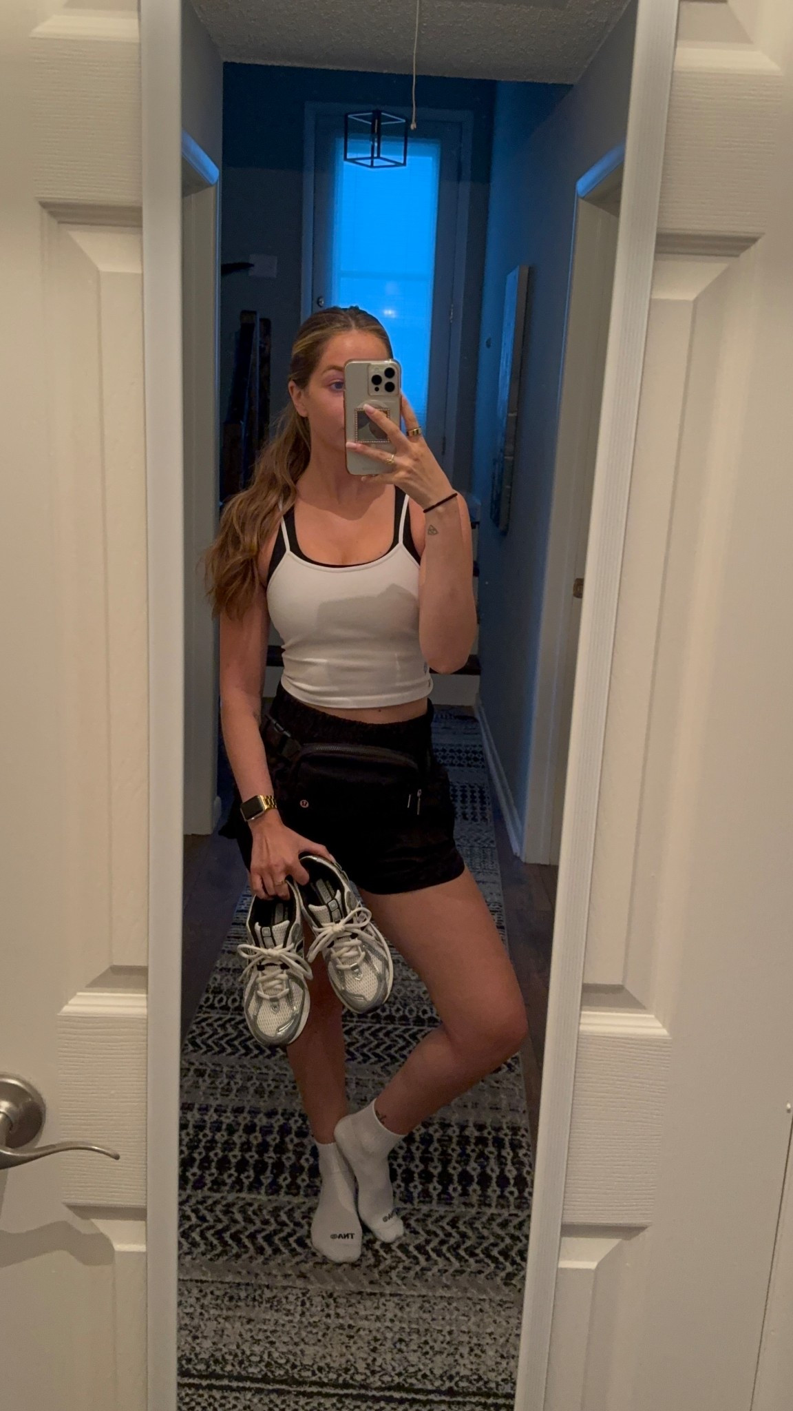 Size small tank, small/4 shorts, size 8 shoe, size 4 sports bra. Everything fits true to size!! 