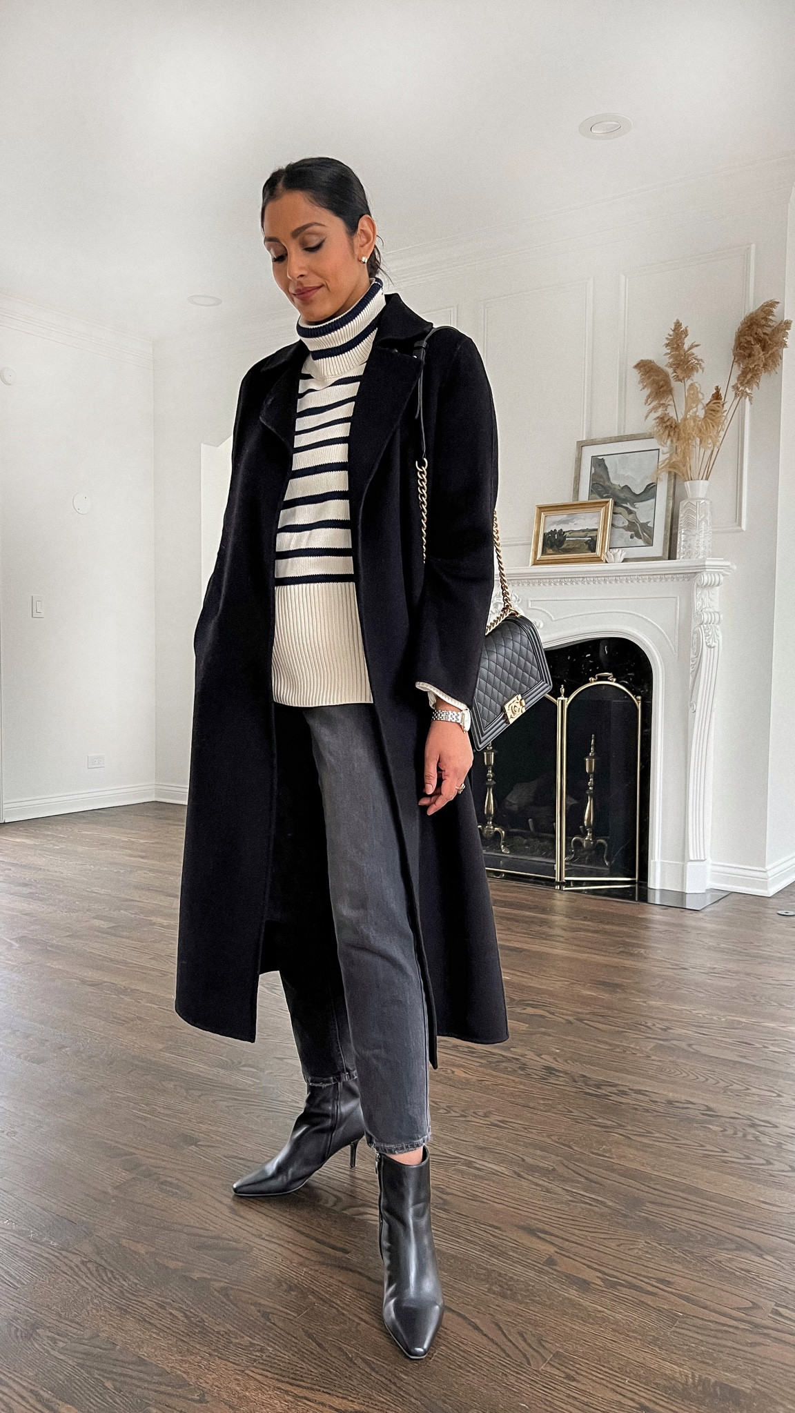 Stripped sweater. Silk maison black long wool coat. Wrap coat. Chanel. Black booties. 

#LTKstyletip #LTKworkwear #LTKunder50