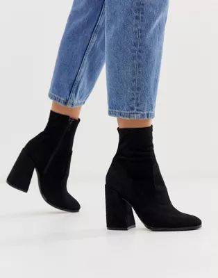 ASOS DESIGN Ellan heeled sock boots in black | ASOS (Global)