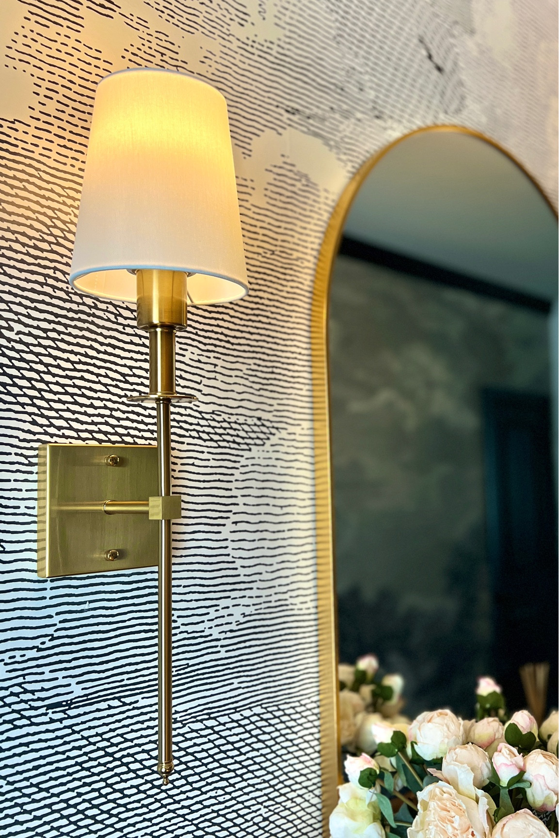 Foyer gold wall sconce set of 2. Rechargeable lightbulb - the battery on these is amazing! 

#LTKfamily #LTKstyletip #LTKhome