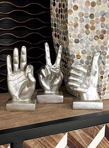 CosmoLiving by Cosmopolitan 97709 Large, Metallic Silver Hand Sculpture Table Décor Statues w/ T... | Amazon (US)