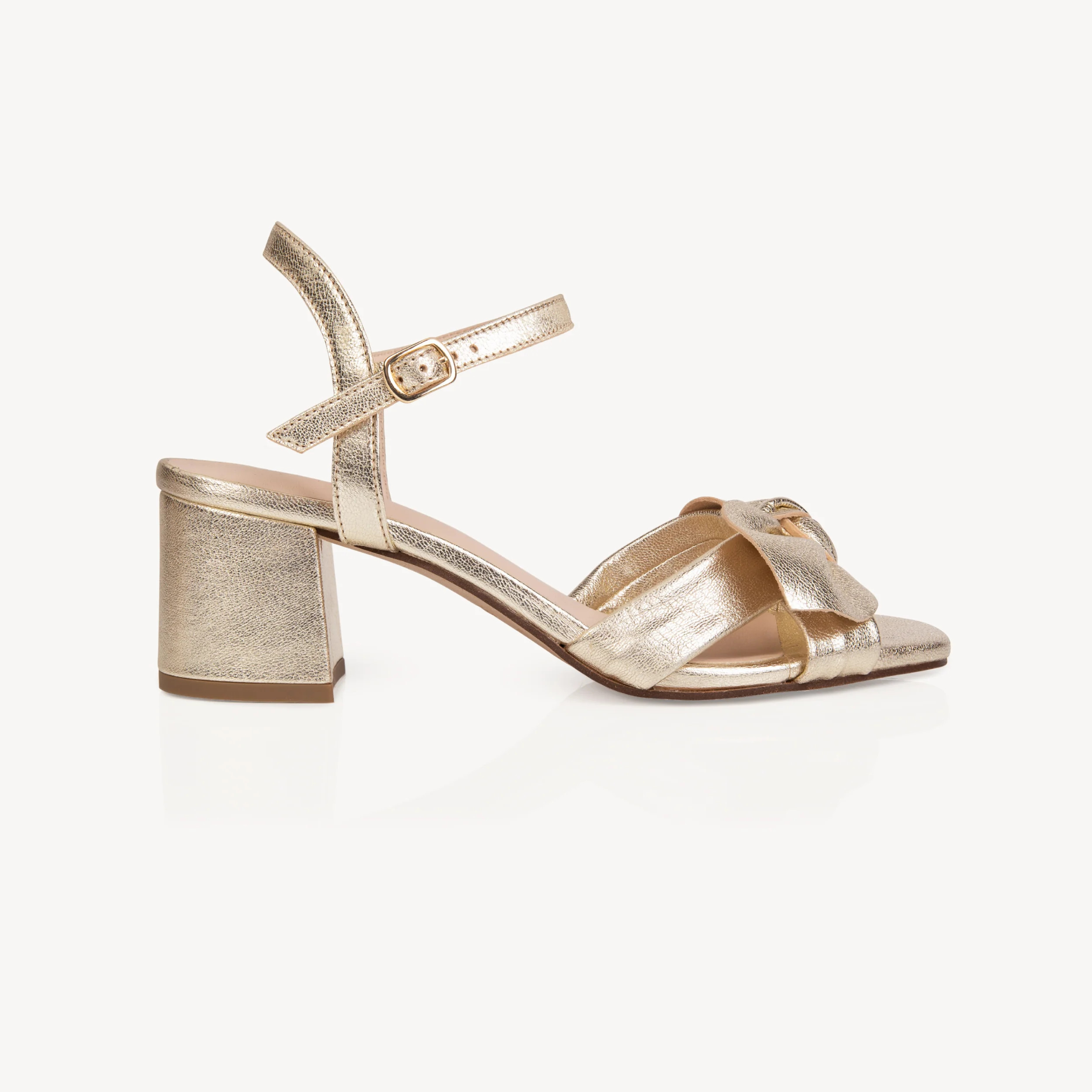 Dancing Queen: Gold Metallic Block Heel Sandals from Air & Grace | Air & Grace