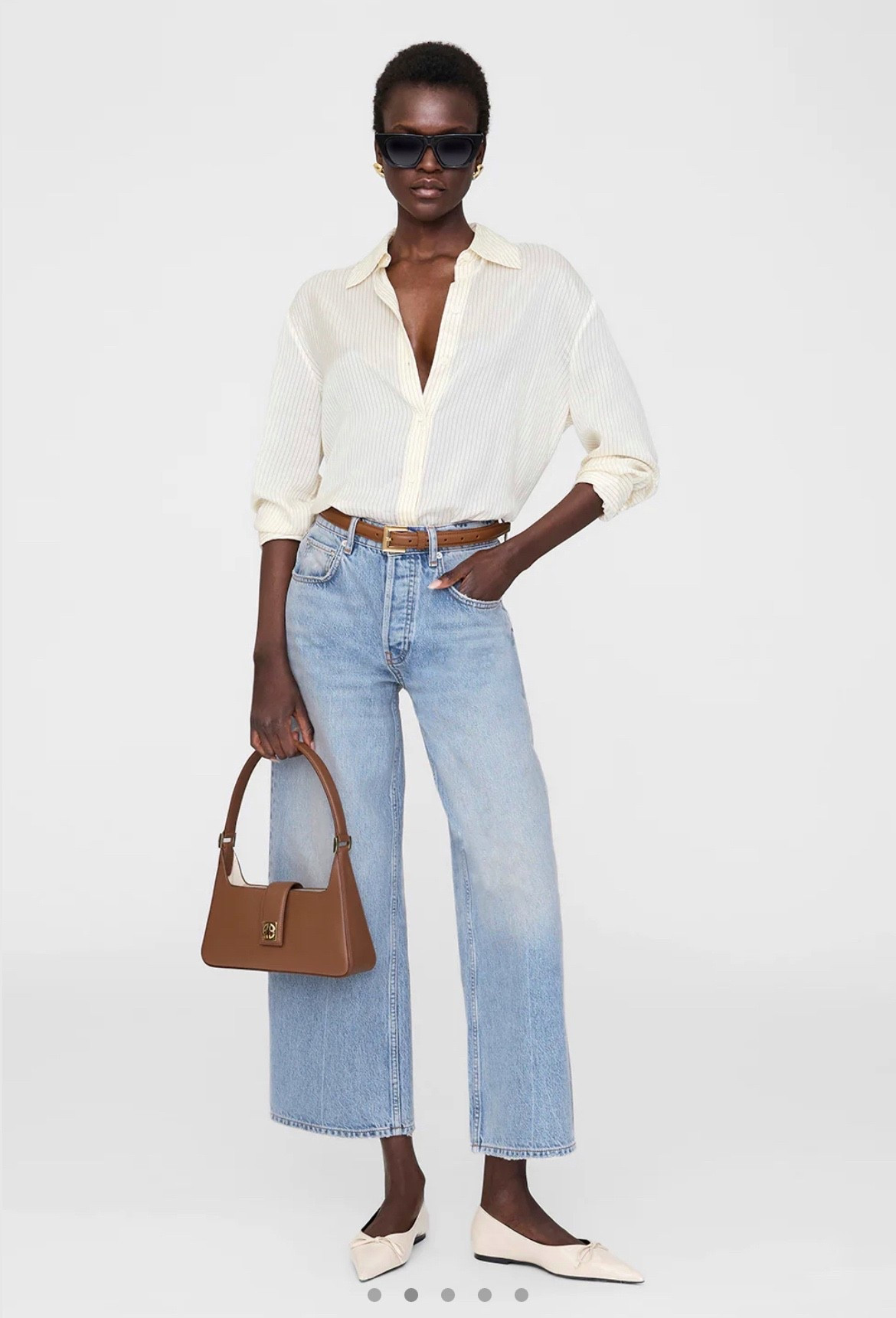 The Lou Shoulder Bag in rich cognac is the ultimate upgrade- minimal, structured, and timeless. A piece that elevates denim and a crisp white shirt into a chic, pulled-together look.