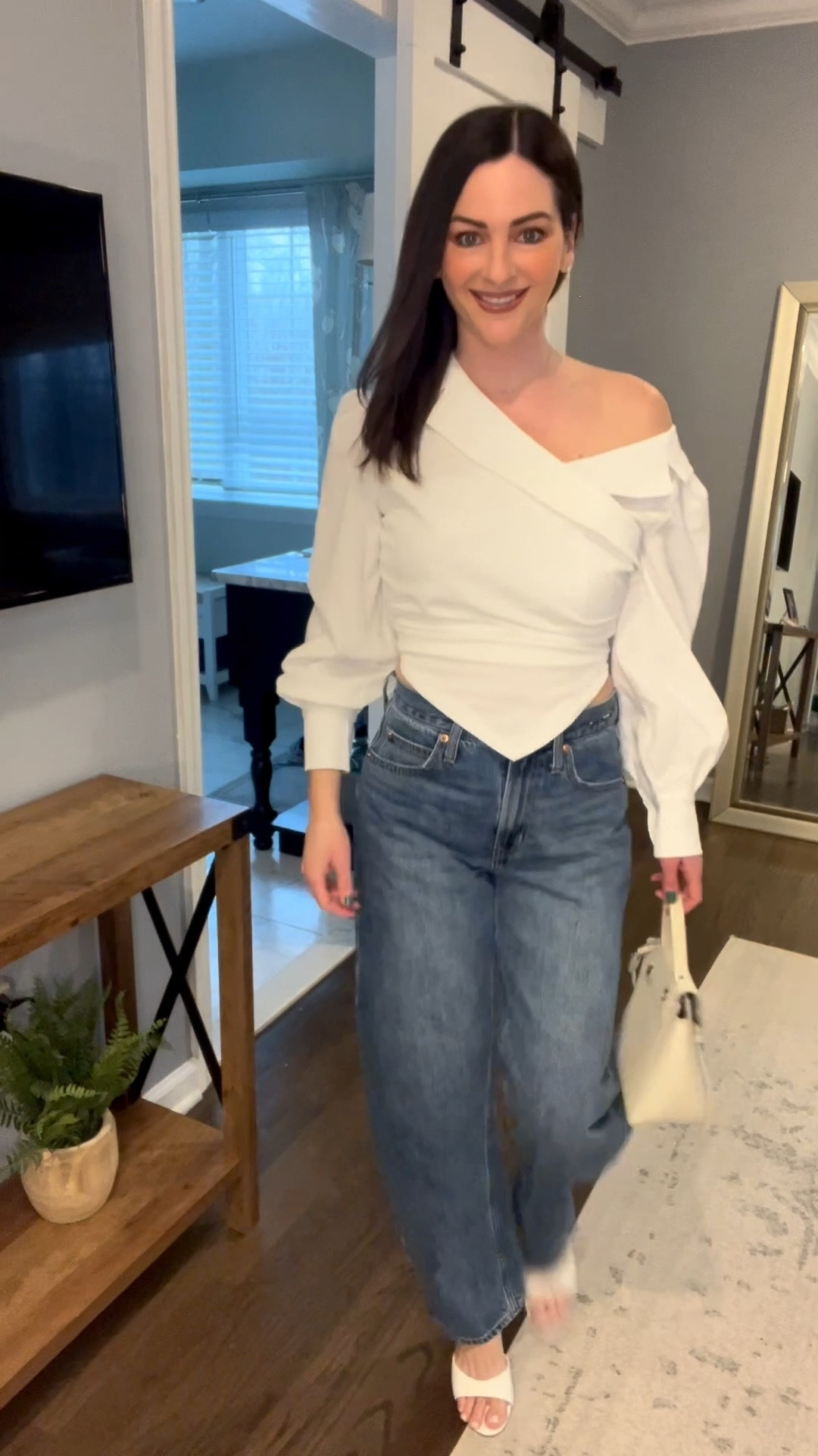 GRWM for date night 🤍✨



If you’ve been searching for the perfect spring date night outfit, this is it. An off the shoulder white blouse paired with classic denim is that effortless, chic combo that always works. Styled it with white open toe heels and a matching white purse for a clean, elevated look that transitions perfectly into spring 🌸



This is your go-to if you need date night outfit ideas, spring outfit inspo, or an easy jeans and heels outfit that feels put together but still comfortable.



Perfect for dinner dates, girls night, or any spring night out 🤍 #datenightoutfit #springoutfits #springstyle #outfitinspo #jeansandheels #grwm #whitelook



#LTKPetite #LTKgrwm #LTKSeasonal