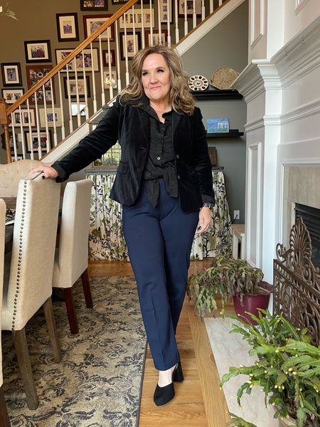 Classic navy pants with very flattering smoothing panel. Size 2.5 tts. 

Linking similar velvet blazer that’s 50% off. They’re getting hard to find. 

Lace blouse I size up to an XL to have room to tie at the waist. 

Shoes comes in multiple colors including black  

#LTKHoliday #LTKworkwear #LTKSeasonal