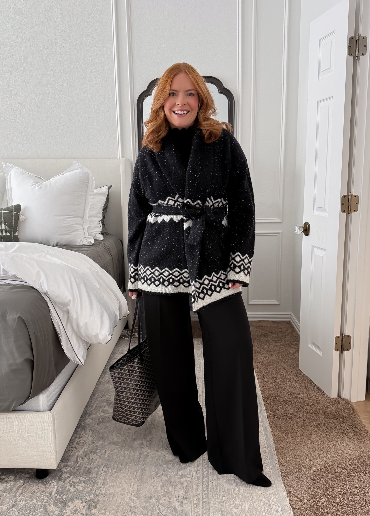 Chic workwear outfit styled with black work pants.
A statement cardigan instantly upgrades a simple office look. Perfect for office outfits for women who want professional style with minimal effort.

#LTKWorkwear #LTKmomlife #LTKootd