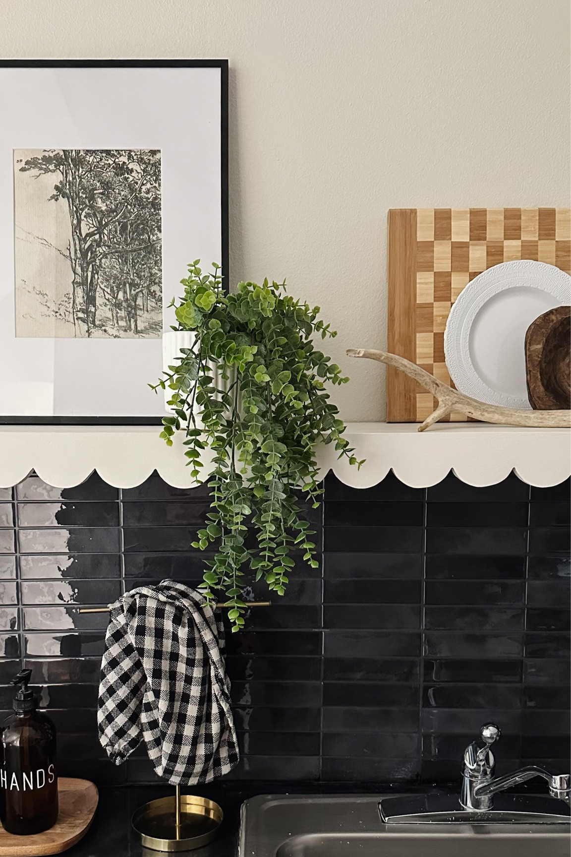 Kitchenette - update on a budget! We used peel and stick tile, leftover cabinet paint and epoxied over the old laminate countertops. The outcome - a LOT of work but a big return.

#LTKhome