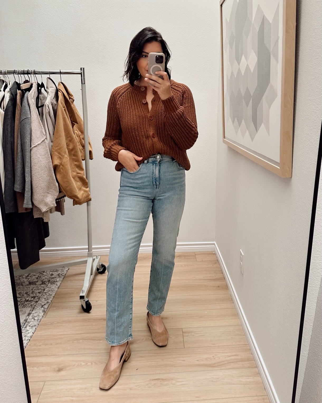 I'm in the large of the sweater -- I find it runs small! 

I'm in the 29 of the jeans, TTS fit.  

 