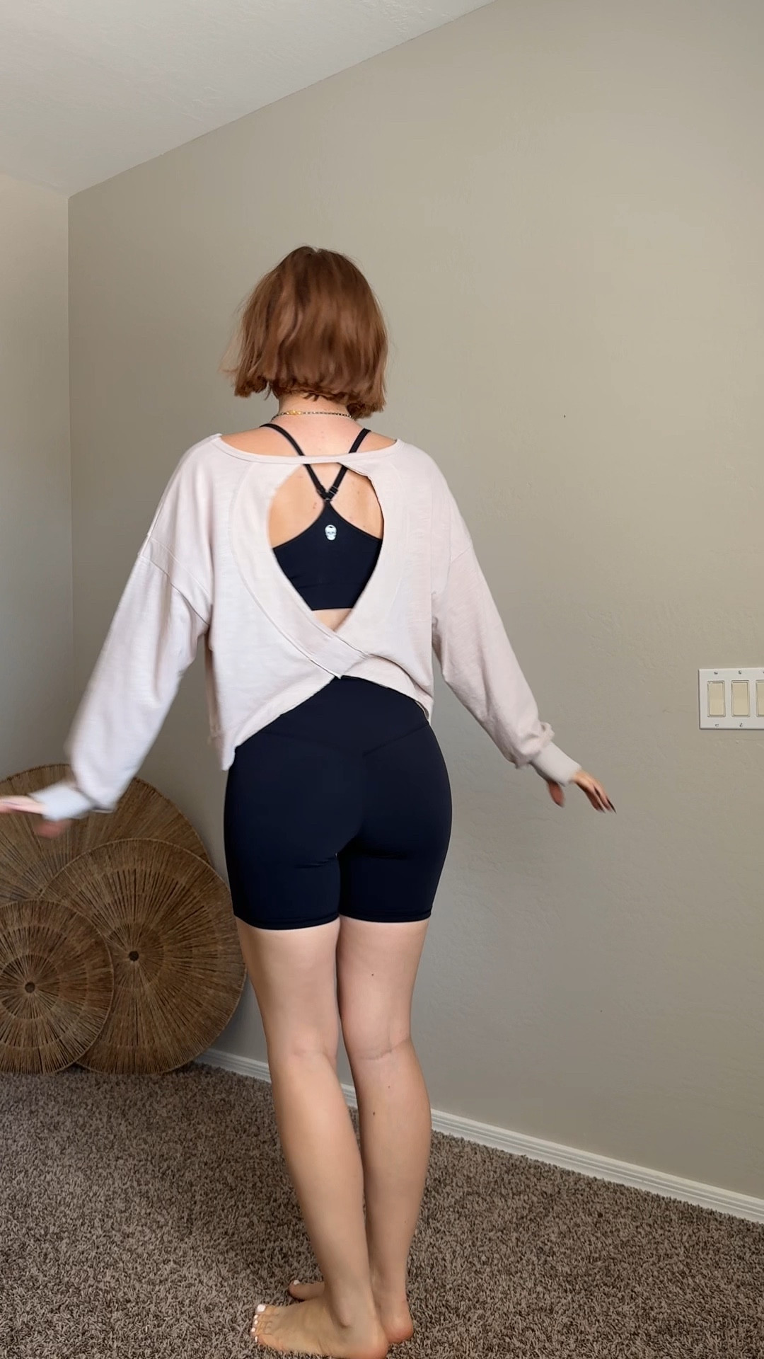 Amazon activewear try on haul, part 3:
• Open back long sleeve w/ thumb holes and raw hem: size small
• Black Racerback sports bra: Gymreapera size small
• Black biker shorts: size medium, 2 pack, black and grey 

#LTKActive #LTKFindsUnder50 #LTKPetite