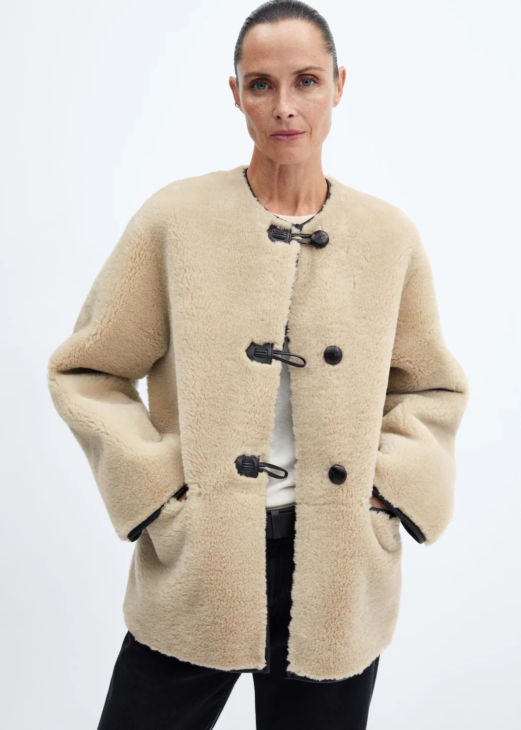 Fur-effect coat with appliqués | Mango Canada