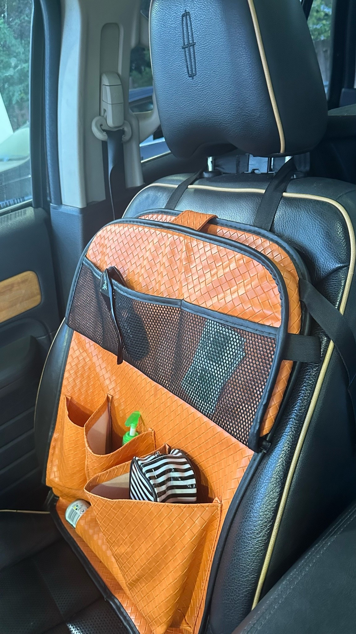 Orange is hard to find - this leather woven car organizer is a steal on Amazon $10.00