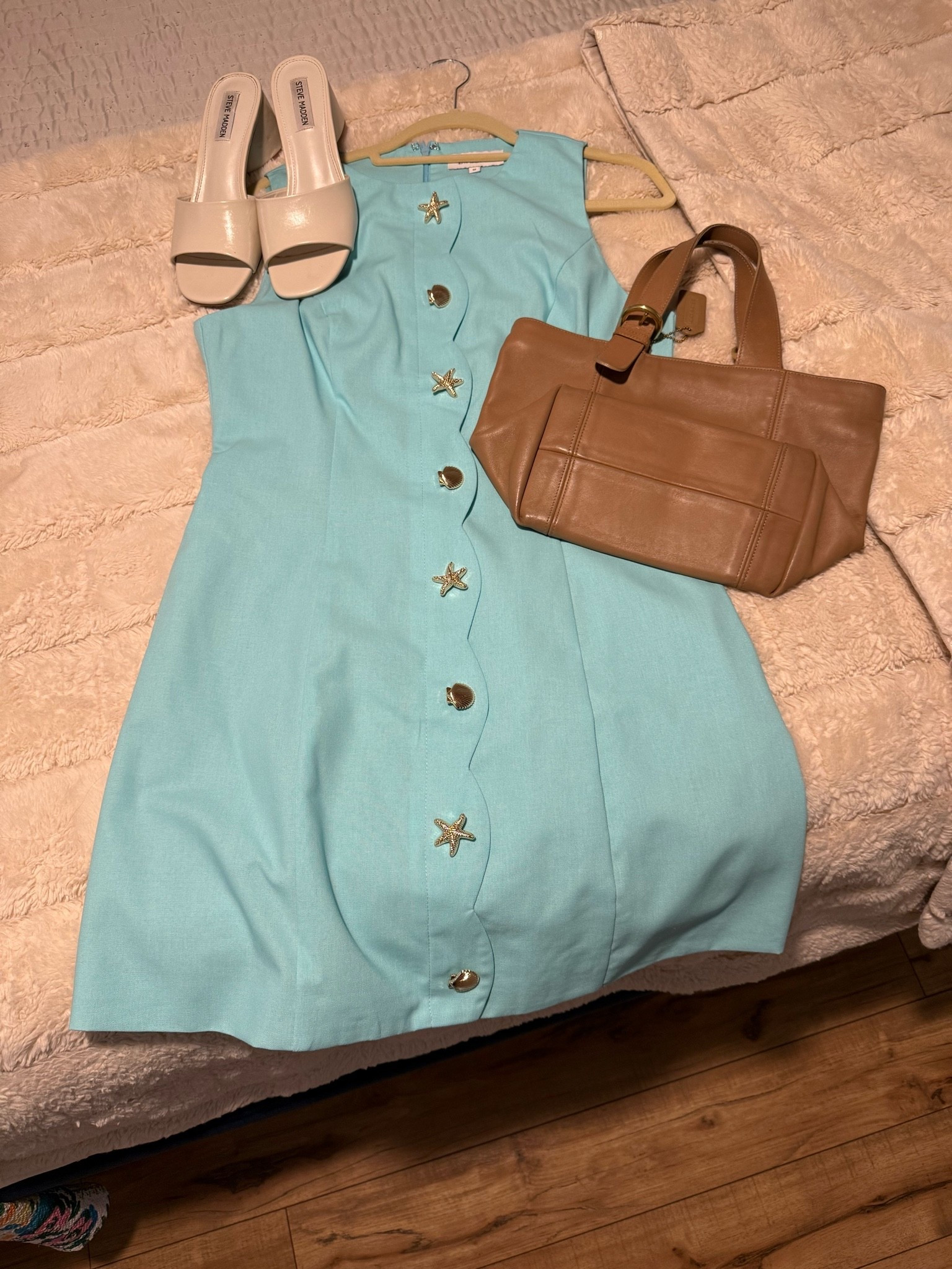 I am
Obsessed with this dress and cannot wait to wear it! The detailed buttons are the cutest and this dress with pair well with all neutrals as well as other bright colors! I also think it is a great vacation dress with the beach themed buttons!

#LTKgrwm #LTKootd #LTKTravel