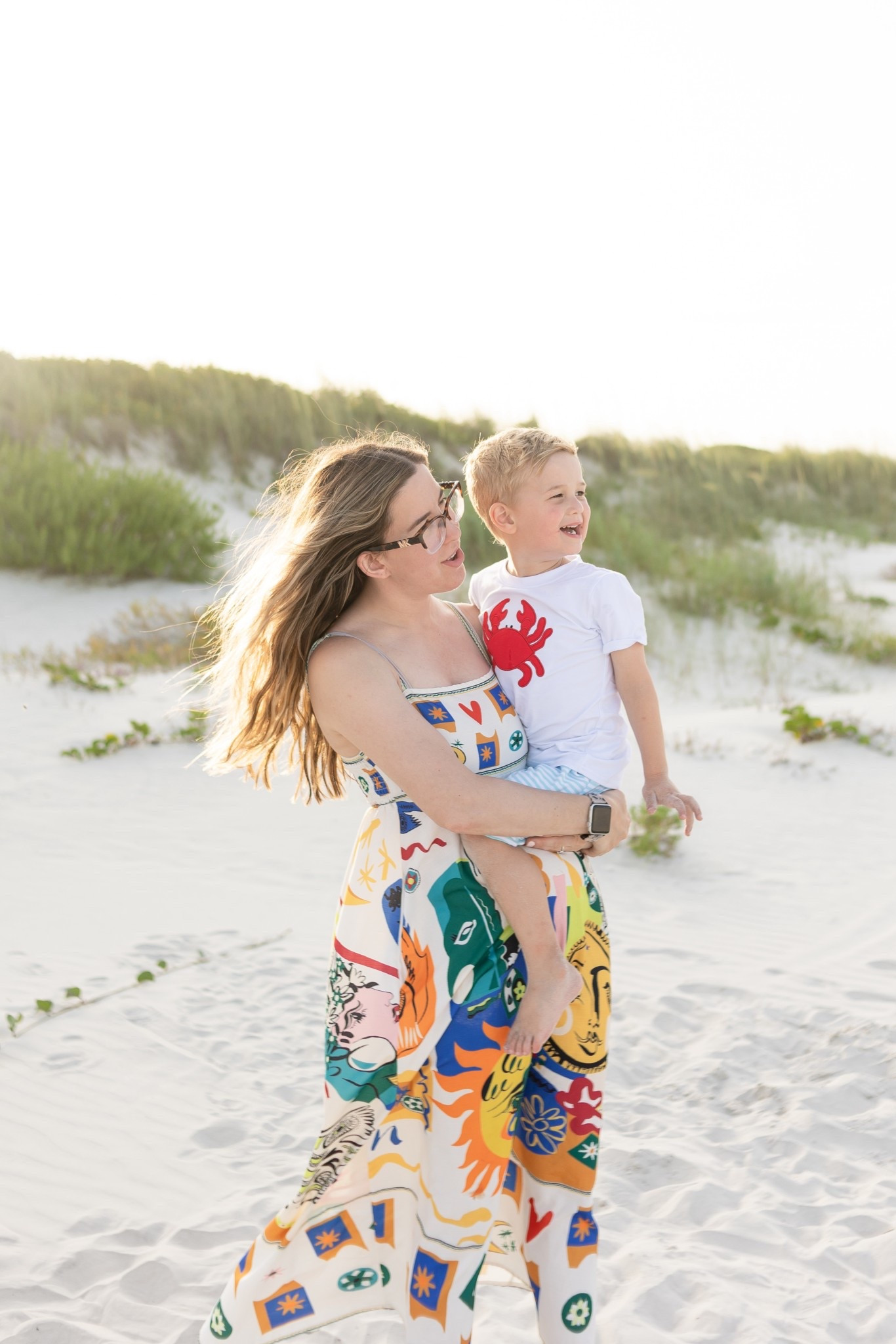 The beach at sunset with my boy! His shirt is from Stitchy Fish! 