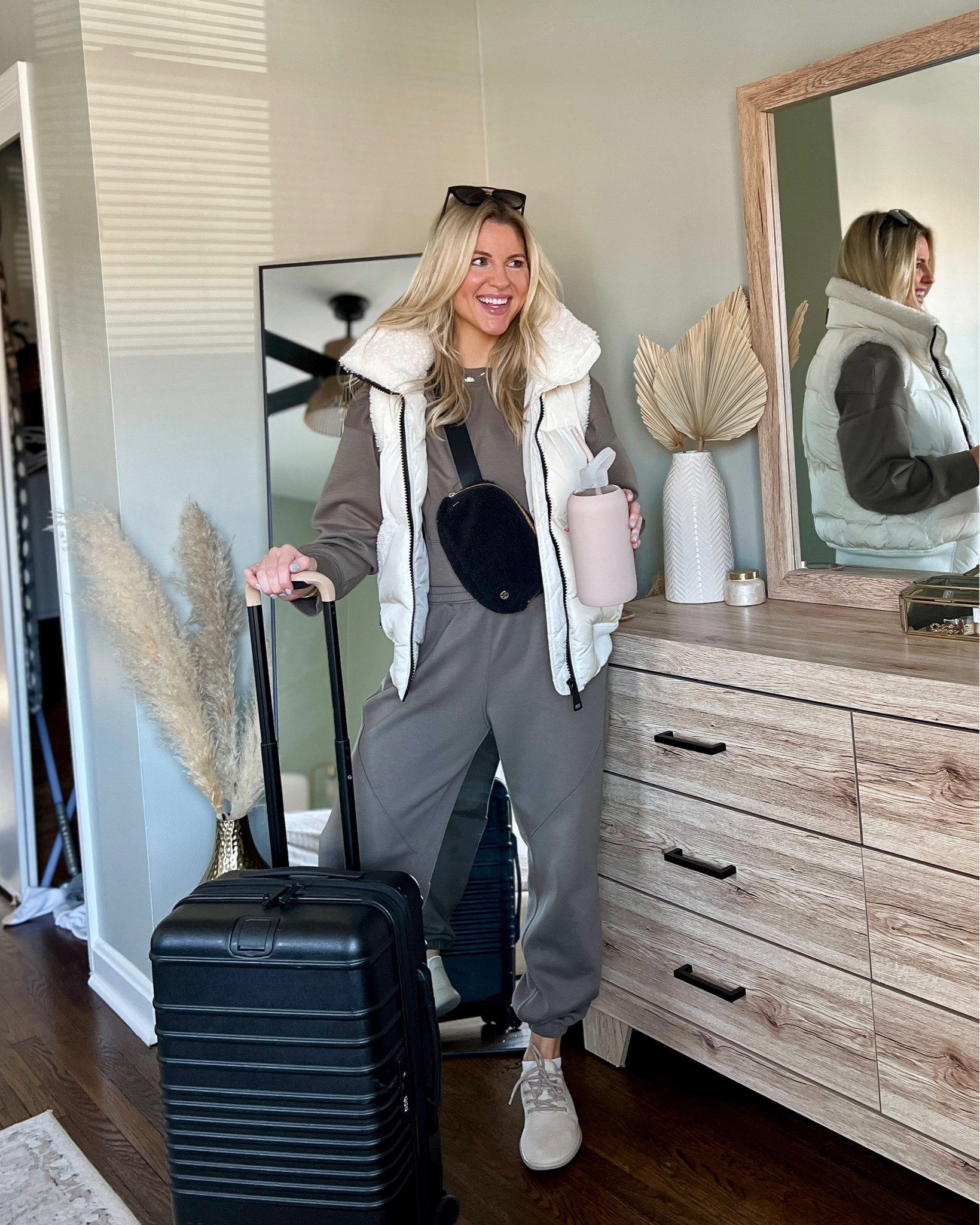 day 1/5: winter travel outfits ✈️

Abercrombie set, Sam New York Sherpa vest, lululemon belt bag, Beis carry on roller suitcase, BKR water bottle, allbirds neutral sneakers, Krewe sunglasses, eberjey pajamas 

#abercrombiestyle #beis #lululemon #puffervest #airportoutfit 

#LTKtravel #LTKSeasonal #LTKVideo