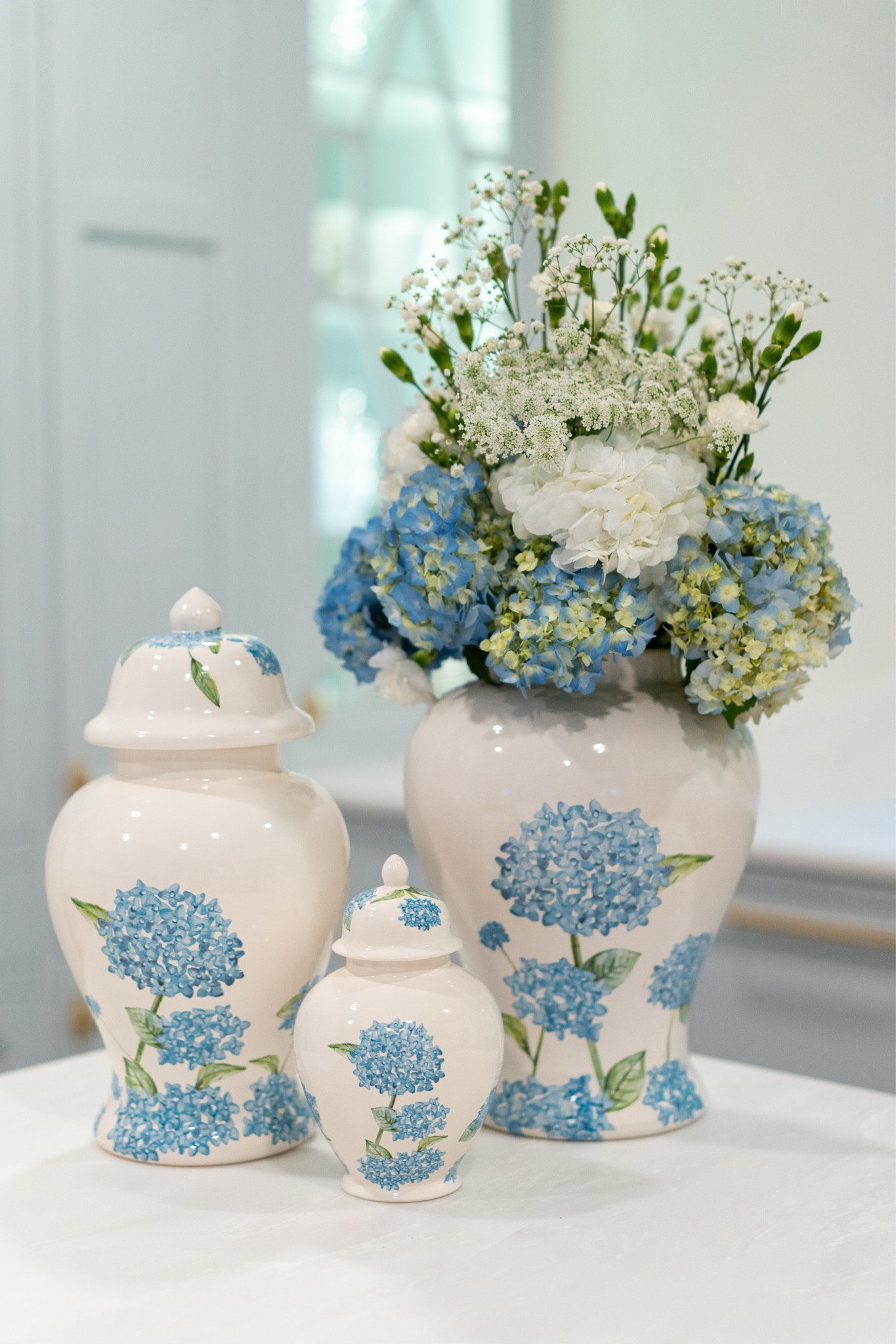 The Chapple Chandler x Lauren Haskell collection is live!! Use my code CHAPPLE15 for 15% off my collection!

Home decor ceramic vase ginger jar grandmillennial home decor wallpaper blue ditzy floral dress jewelry accessories Pearl earrings blue hydrangea jar pottery accents 

#LTKsalealert #LTKGiftGuide #LTKhome