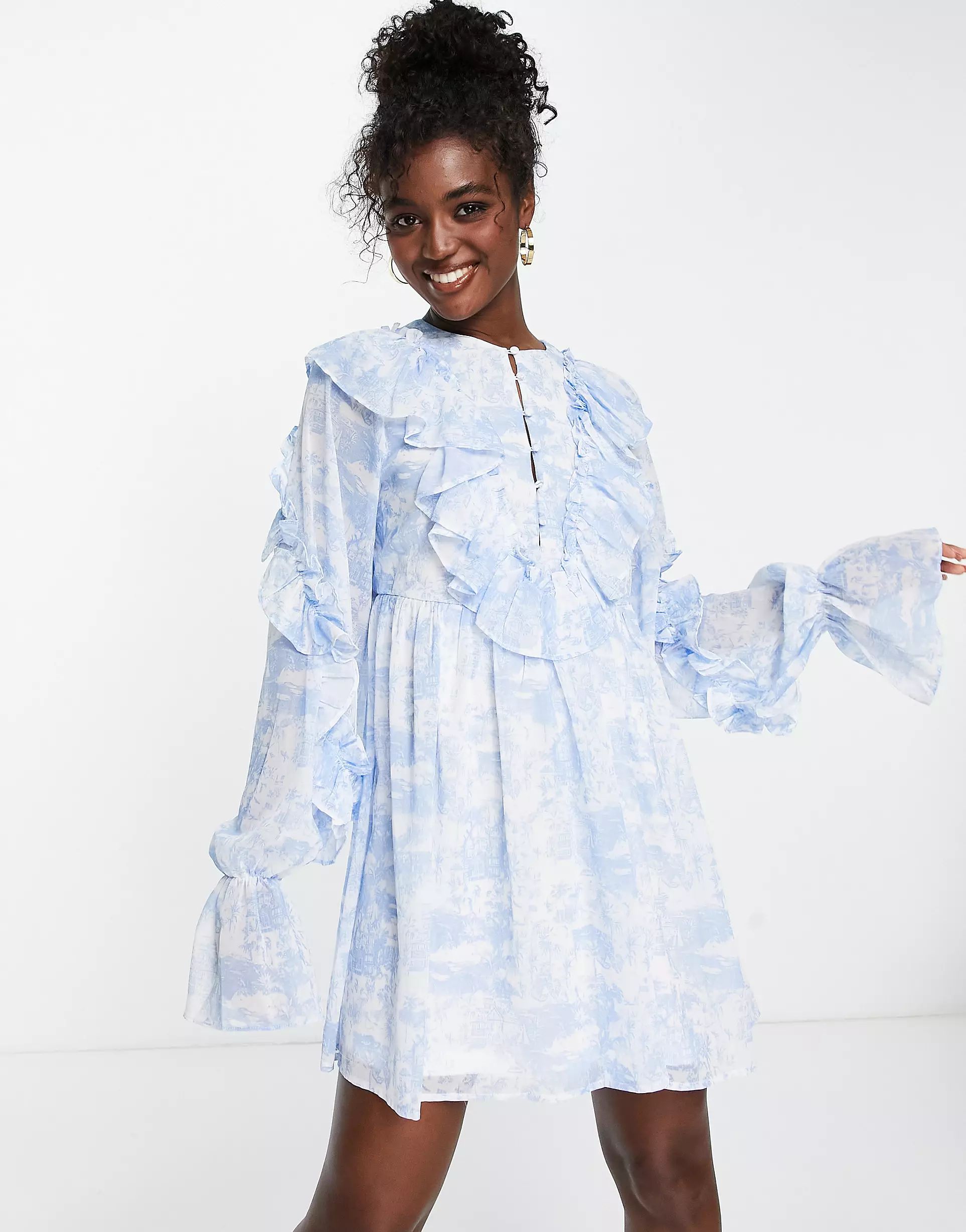 In The Style x Lorna Luxe exaggerated frill detail mini tea dress in blue multi | ASOS (Global)