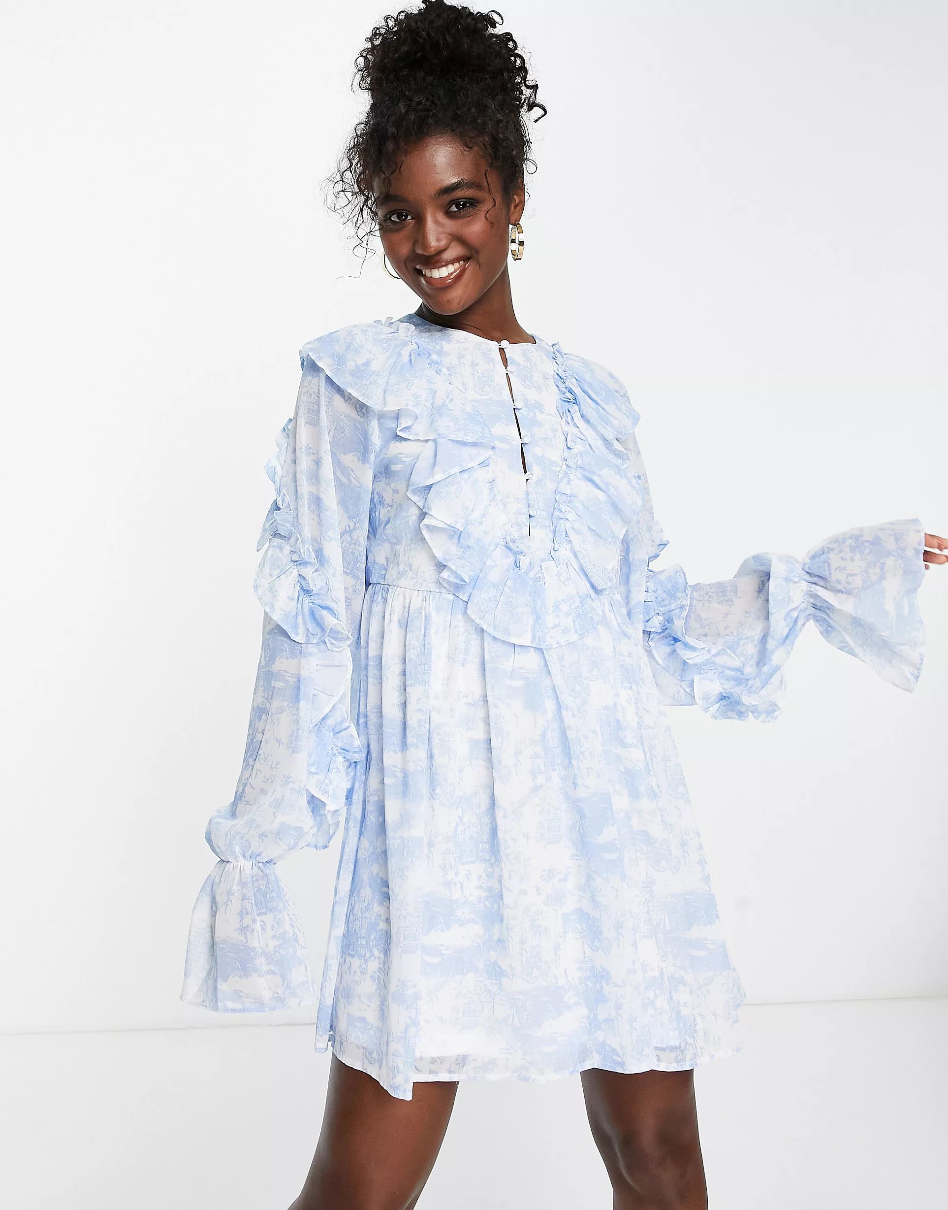 In The Style x Lorna Luxe exaggerated frill detail mini tea dress in blue multi | ASOS (Global)