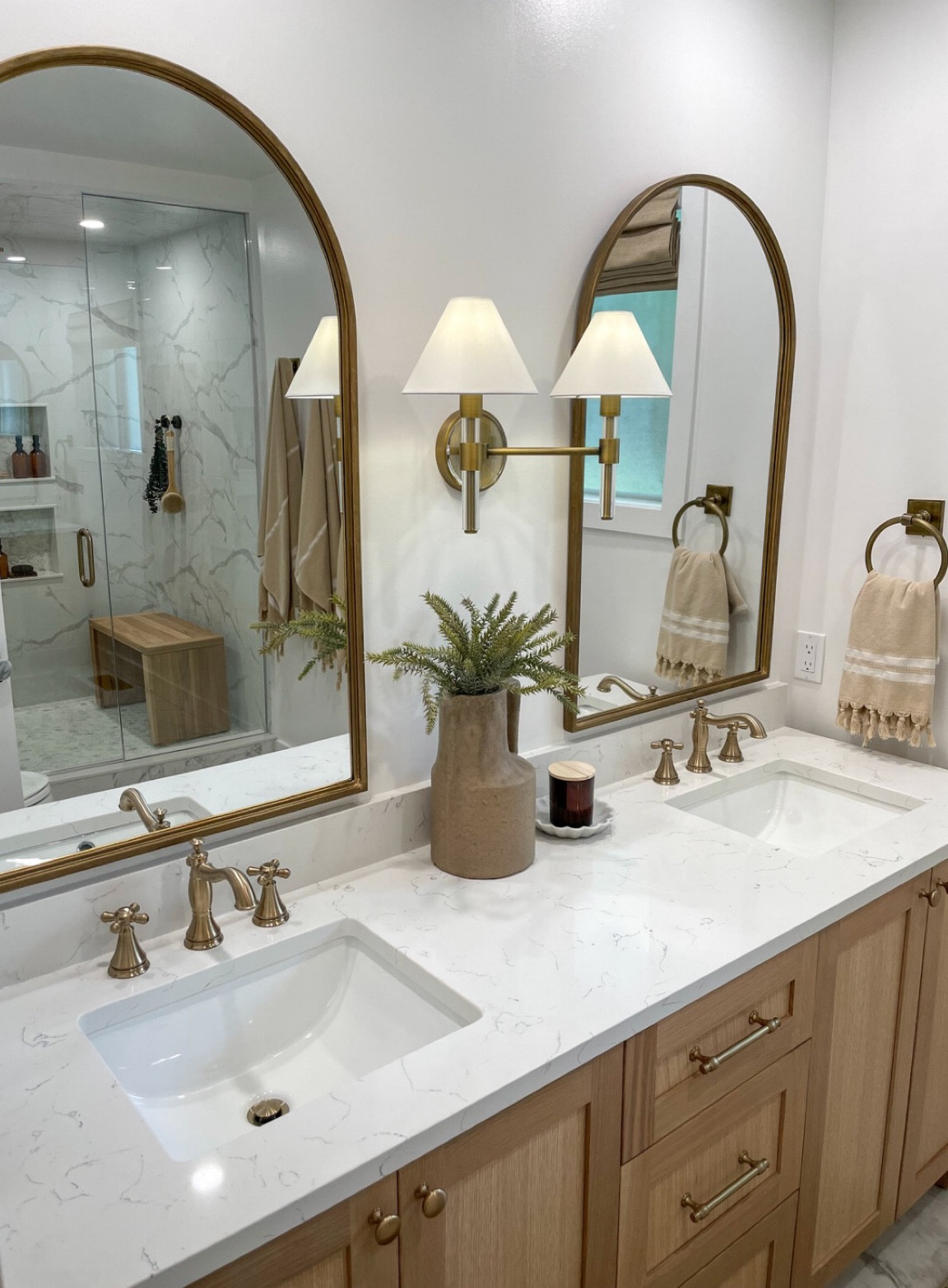Primary Bathroom!

Master bathroom, bathroom, faucet, shower, champagne bronze, shower bench, sconce, arched mirror, primary bathroom

#LTKhome #LTKstyletip