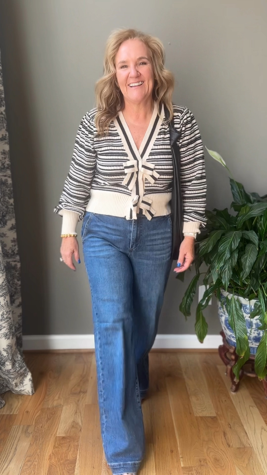 I could not wait to share this cutest sweater and jeans! Trouser style. True to size. Nice stretch. 
Sweater I’m in a large. It’s plenty roomy. I’d say the large would fit a size 10-14

My suede sandals are perfect for fall transition. Tts. I’ll link some similar too. 

Fall outfit fall sweater bow sweater trouser jeans work jeans office outfits 

#LTKFindsUnder100 #LTKBacktoSchool #LTKOver40