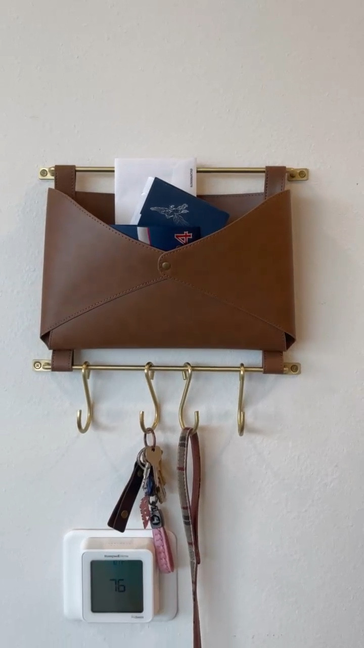 Love this target find! Perfect for holding your mail, keys and a dog leash. The gold detailing is a perfect add on and looks great in my entry way. #targetfind #keyholder 

#LTKxTarget #LTKfindsunder50 #LTKhome