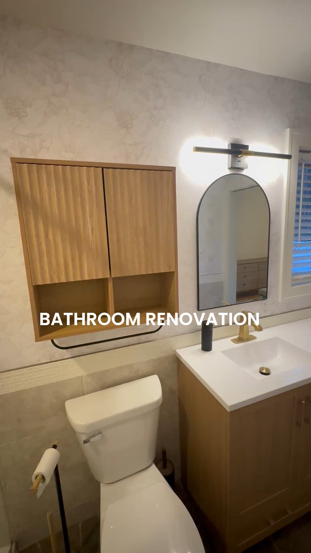 Love this bathroom renovation! A beautiful transformation on a budget. 

The perfect wallpaper for a bathroom, subtle gold and white. Bathroom mirror, light and cabinet 

#LTKhome #LTKcanada