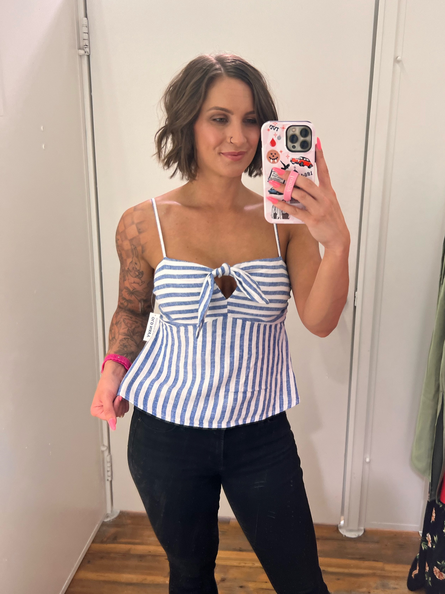 How cute is this stripe top? I’m wearing a small but need to size up for the girls. This would be so cute with some white linen pants or white denim  

#LTKFindsUnder50 #LTKSeasonal #LTKStyleTip