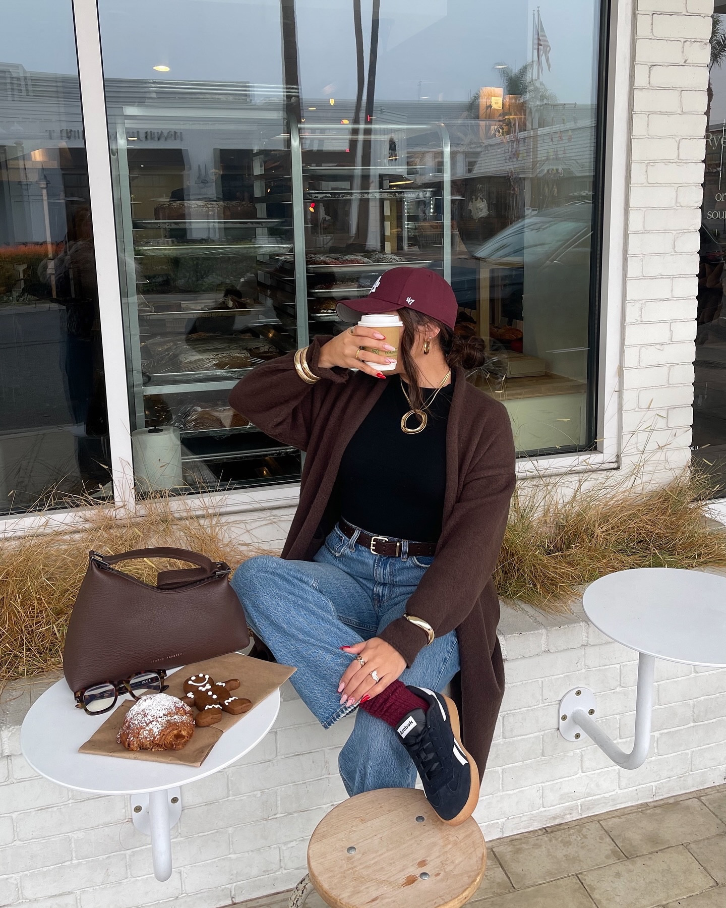 first we drink the coffee - then we do the chit chat ☕️
—
outfit details and sizing will be on my LTKit 🖤🤎
—
Pinterest girl, Abercrombie jeans, brown sweater, casual outfit, Reebok shoes, winter outfit, coffee shop vibes