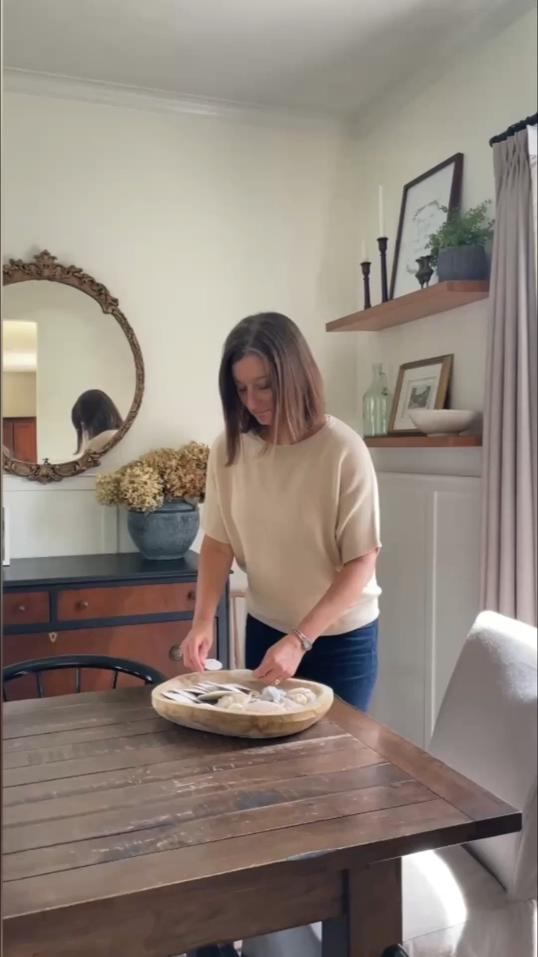Display those shells from the beach on your dining room table.  

Dining room table and chairs.  Quince sweater.  Two pages pinch pleat curtains.

#LTKdayinmylife #LTKHome #LTKOver40