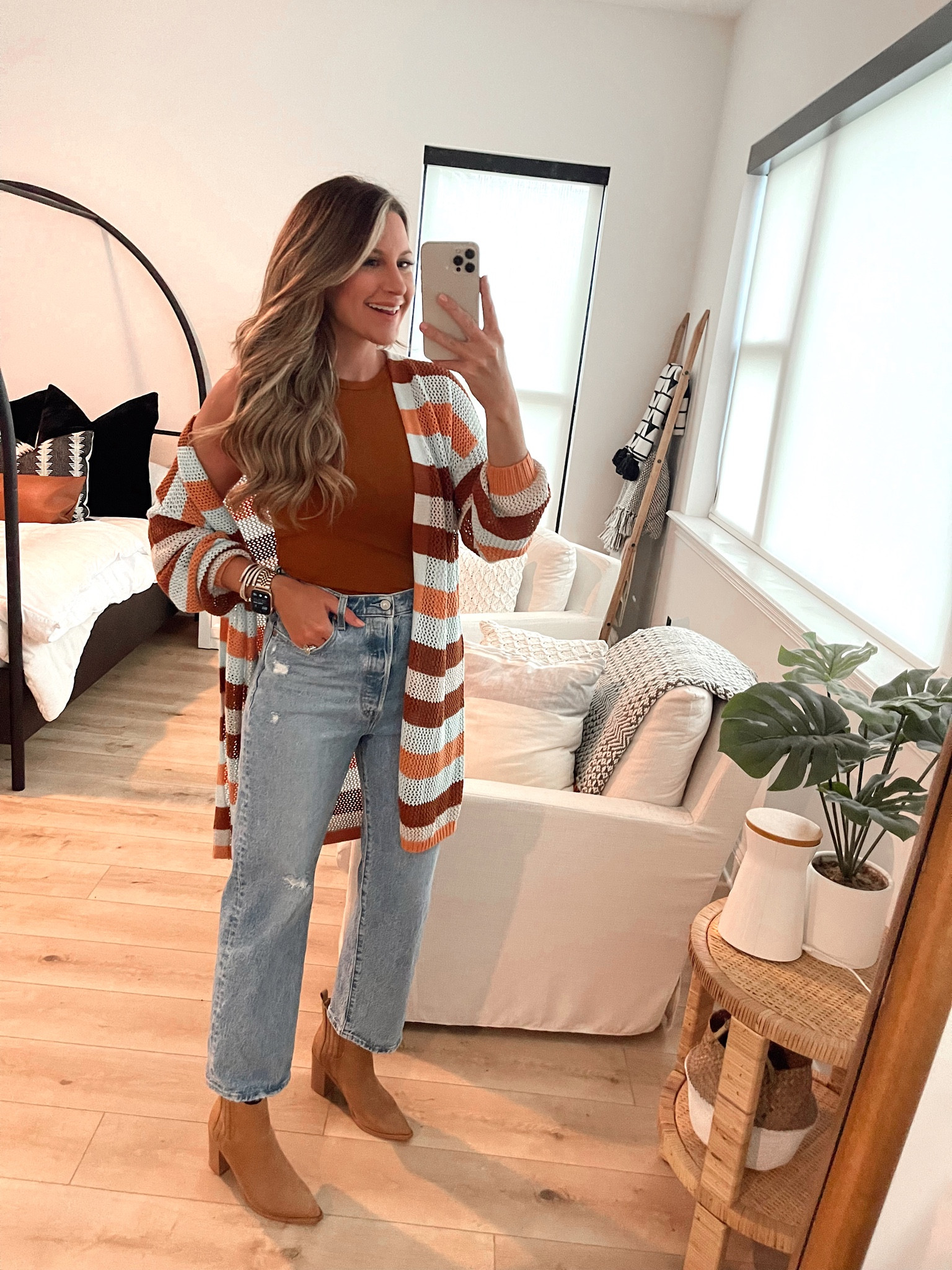 Small in bodysuit and cardigan 
Levi’s fit tts 