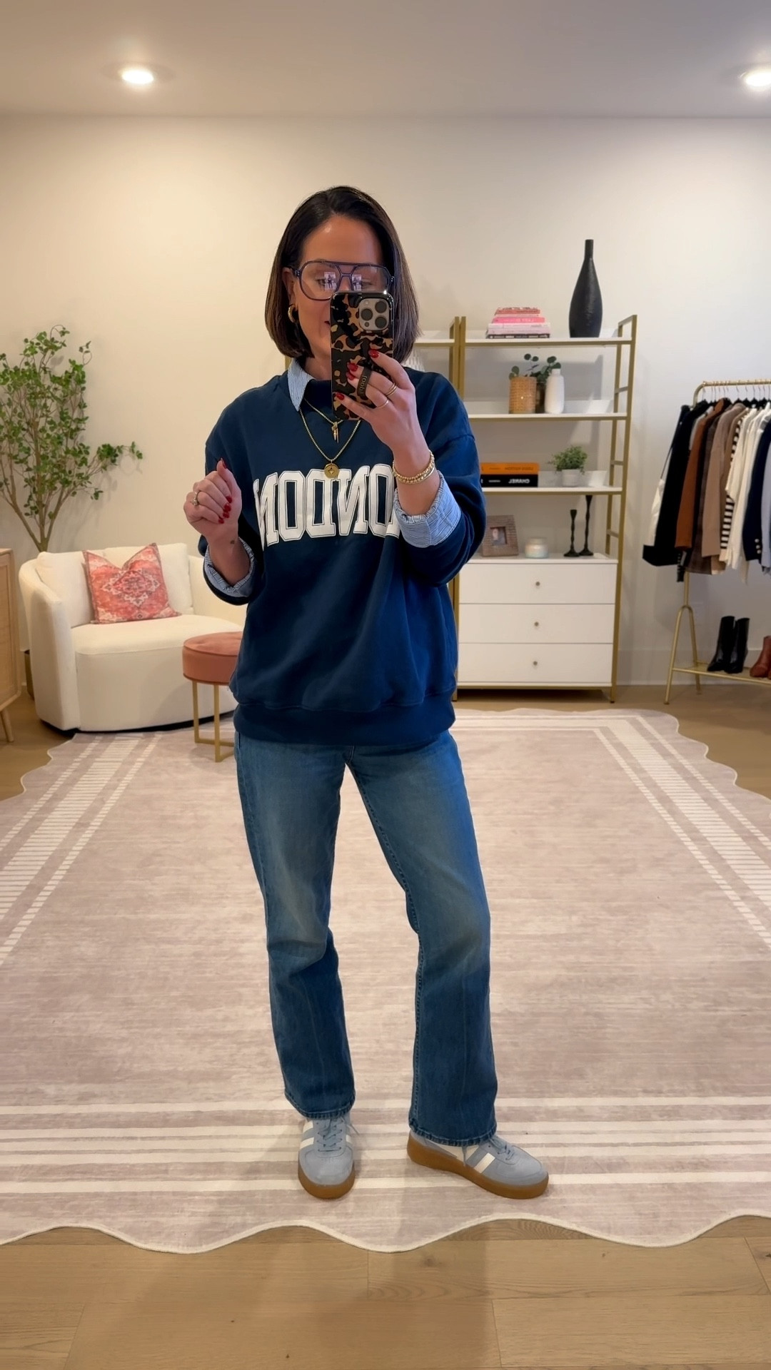 Styling an oversized sweatshirt for a more elevated look! Sweatshirt and button-down are from Anthropologie and jeans are by mother denim scooter ankle - wearing extra small and tops and 25 in jeans 

#LTKOver40 #LTKdayinmylife #LTKgrwm