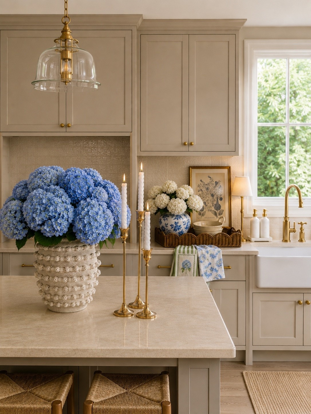 Kitchen Styling Finds 🌿💙

Follow @farmtotablecreations on Instagram for more cozy home inspiration and curated finds.

These blue hydrangea accents instantly made this kitchen feel brighter, softer, and so much more elevated. From the textured vase to the brass candle holders and pretty floral textiles, these are the kinds of pieces that make a home feel collected and welcoming. I love mixing soft blue tones with warm neutrals for that timeless kitchen look. ✨

#ltkhome #kitchendecor #hydrangeadecor #blueandwhite #amazonhome

kitchen decor | blue hydrangeas | brass candle holders | kitchen island decor | blue and white decor | neutral kitchen | cozy kitchen | kitchen styling | cottage kitchen | floral decor | woven tray | decorative vase | spring kitchen decor | hydrangea stems | countertop styling | farmhouse kitchen | traditional kitchen | home styling | elegant home decor | kitchen accessories | decorative accents | neutral home decor | timeless decor | amazon home finds | kitchen inspiration

#LTKSaleAlert #LTKHome #LTKSeasonal