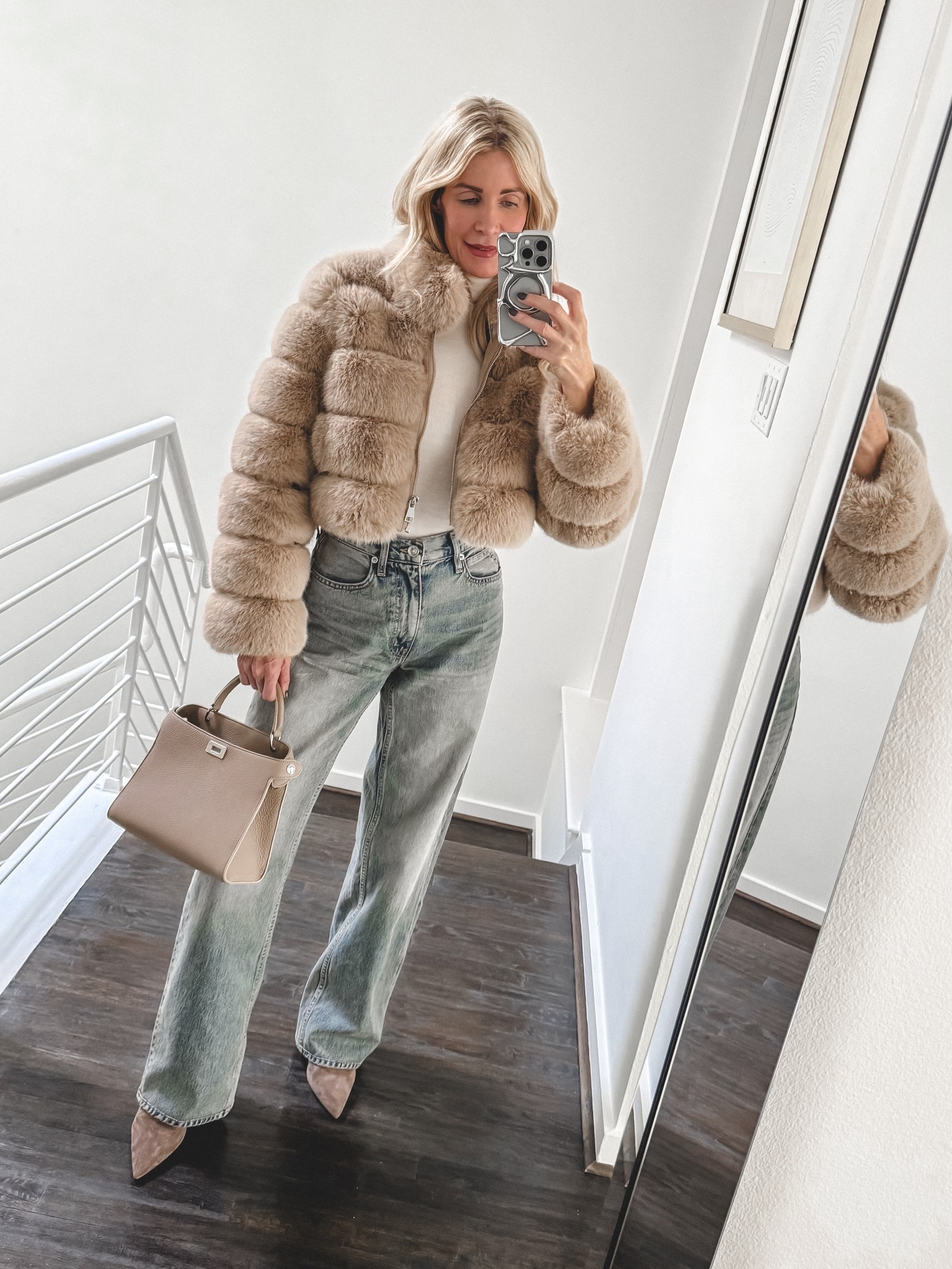 RESTOCK ALERT!! >> This cropped faux fur jacket instantly elevates even the simplest outfit and it's FINALLY back in stock!! It adds texture, warmth, and that luxe factor without feeling bulky, which makes it perfect for dressing up denim or layering over a sleek evening look. I’m wearing an XS in the cropped faux fur jacket, and it fits true to size.  

 #LTKSeasonal #LTKOver40 #LTKFindsUnder100