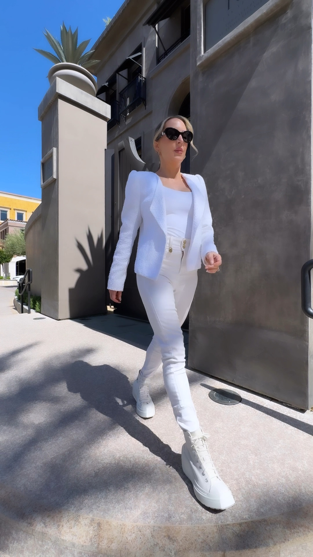 White skinny jeans summer outfit idea, Converse high tops outfit idea: white skinny jeans, white bodysuit, white boucle blazer and white Converse high top wedges.

#LTKShoeCrush #LTKStyleTip #LTKVideo