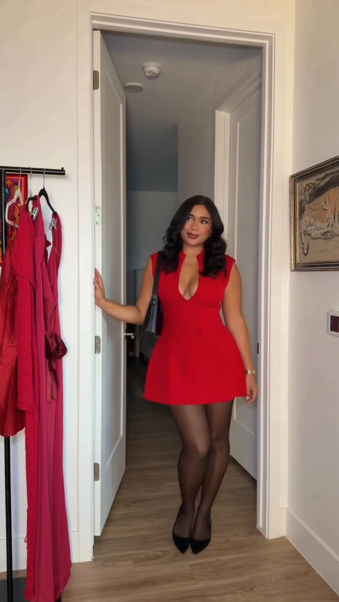 most iconic color combo in the winter♥️🖤
this whole fit is Amazon & this dress is one of my all time favorites/ even comes in a long sleeve version! Dress runs true to size I’m wearing a M (US 6-8), it’s stretchy and so flattering. Tights & heels are also Amazon! #holidaydress #reddress #dressinspo