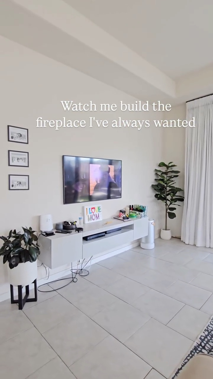 When I was a kid, we didn't have a fireplace in our home. I remember always thinking to myself that when I got old enough to have my own home I just had to have a fireplace, especially for Christmas time. There was just something that little me thought was magically about having a fireplace during Christmas, that clearly I still desired enough in adulthood to figure out out to achieve it myself. Little Tyra would be so happy and proud of myself!

Fun fact Home Alone was my favorite movie as a kid! I drove my mom crazy watching that movie all year round 😅
.
#diy #diyhome #fireplace #beforeandafter #homerenovation #reno #homeproject #modernhome #livingroom #homemakeover #mantle #homedesign

#LTKFindsUnder100 #LTKvlog #LTKHome