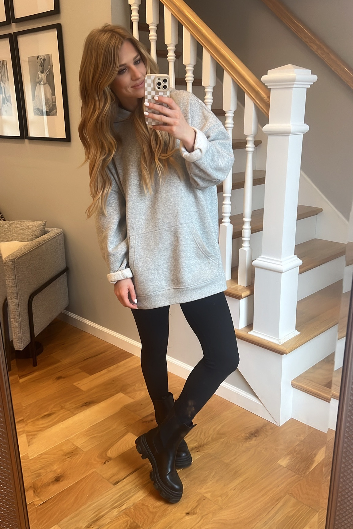 Gray oversized sweatshirt with black leggings and black Chelsea boots 

#LTKSeasonal