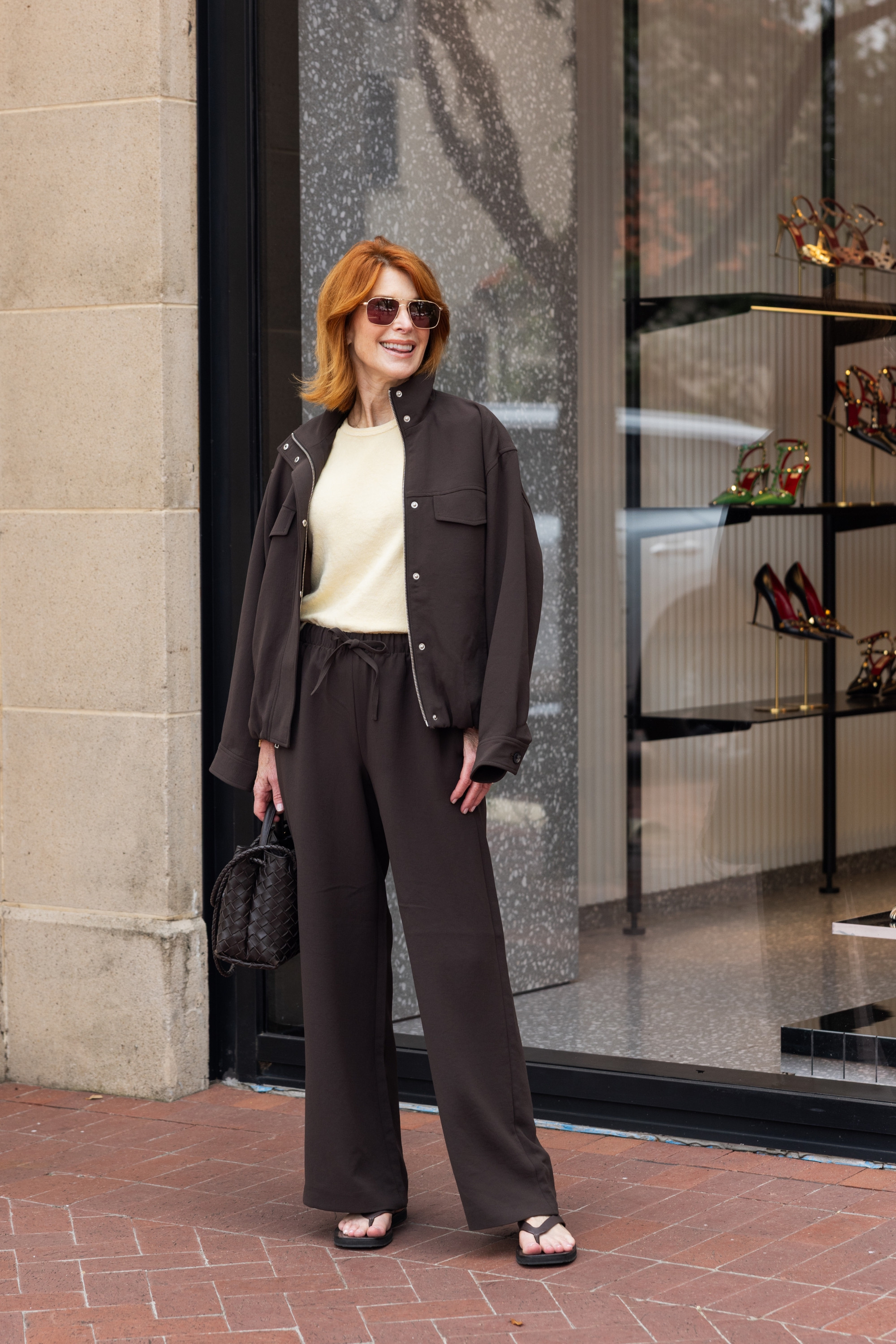 A tonal brown outfit always looks so chic, especially with a woven black handbag and simple sandals. These viral pants and funnel-neck jacket make an easy everyday look for errands, travel, or casual date night outfits. Wearing an XXS in the pants and XS in the jacket. #DateNightOutfits #TravelOutfits #CasualStyle 

#LTKOver40#LTKSeasonal#LTKOver40 

 

#LTKootd #LTKootd