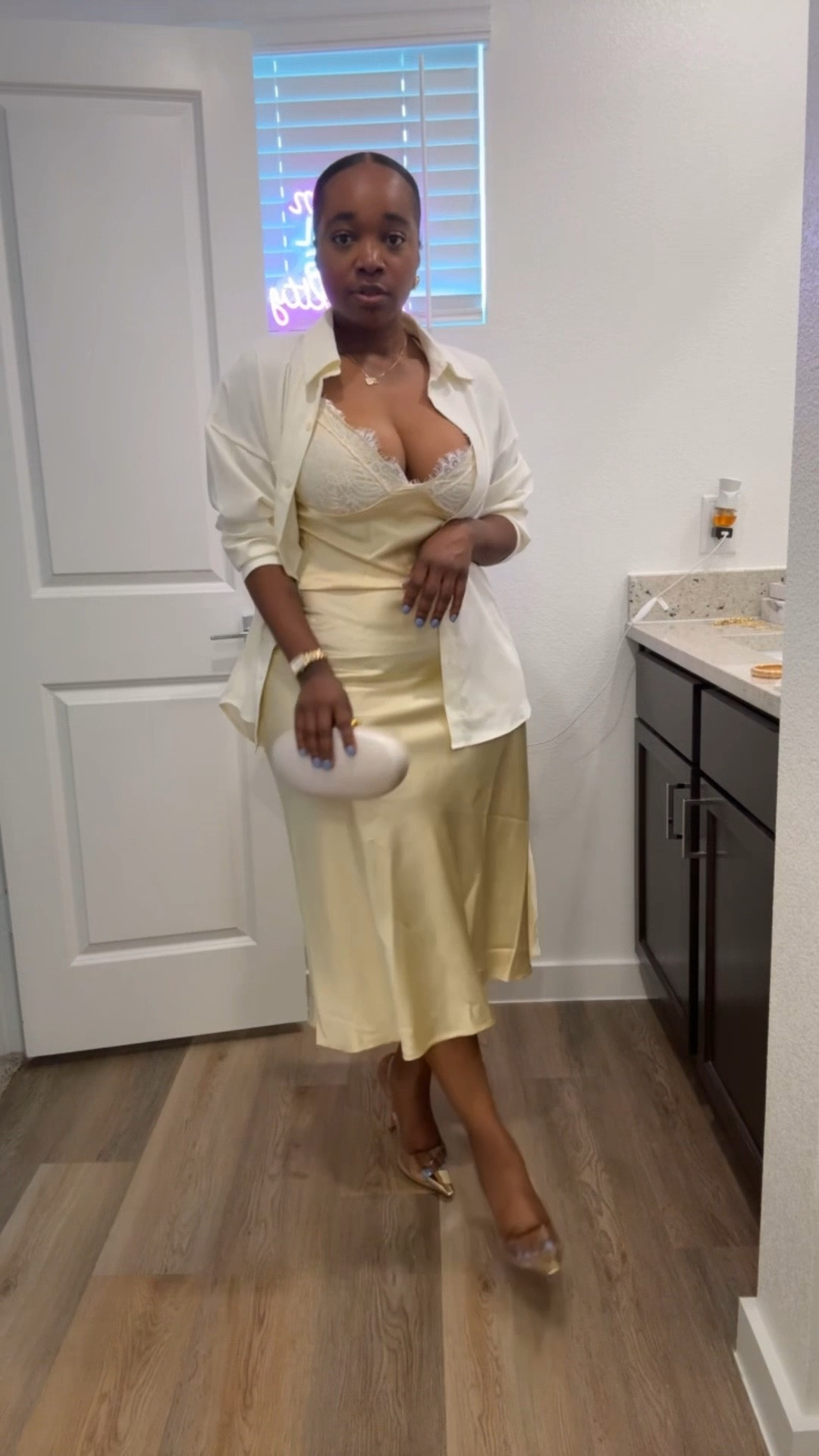 Soft luxury on a midsize frame 🤍✨

Sharing this feminine neutral look featuring a satin midi skirt, lace cami, oversized button-down, statement heels, and neutral accessories. Perfect for brunch, date night, vacation dinners, or summer events.

#MidsizeFashion
#FeminineStyle
#SoftLuxuryStyle
#MidsizeStyleInspo
#AffordableFashionFinds

#LTKU #LTKMidsize #LTKootd