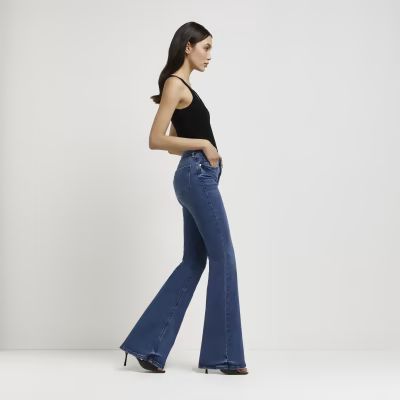 Blue mid rise flared jeans | River Island (UK & IE)