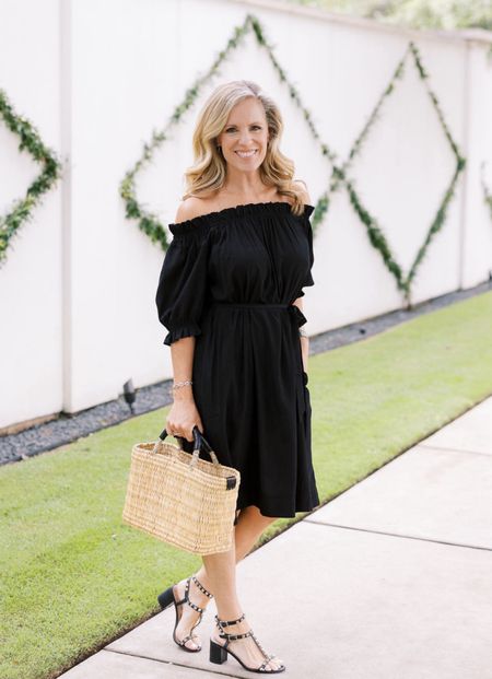 This is the perfect LBD for Spring and Summer with it's light and airy silky fabric. It be packing in for several this summer as it is so easy to dress up like I've styled it here or wear with sneakers for a stylish day al seeing. It will also take up almost no room in my suitcase! I've styled is here with the MERSEA Medina Market basket bag in Medium. These beautiful basket bags are made exclusively for MERSEA in Morocco and beautiful leather trim. 

Off the shoulder, black silk dress, with self tie, paired with basket, bag and black rockstar, gladiator sandals 

#LTKstyletip #LTKover40

#LTKOver40 #LTKStyleTip #LTKSeasonal