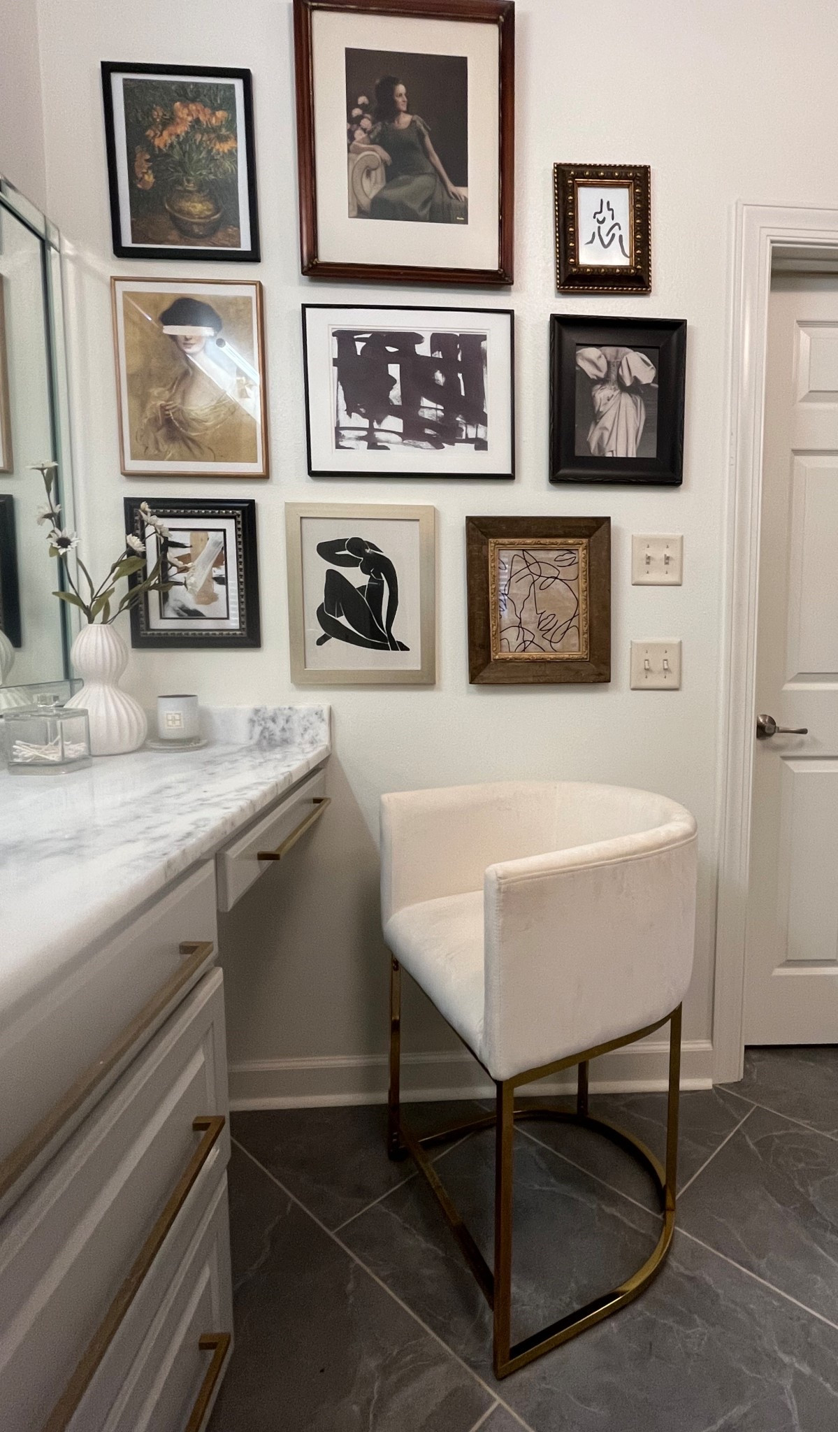 A little moment I love every day 🤍 Getting ready surrounded by old family portraits, personal abstract art, and pieces that feel like me. Bathroom vanity styling should feel personal, not perfect. 
This wall gallery is my favorite spot in our bathroom. 

#LTKHome #LTKdayinmylife #LTKselfcare