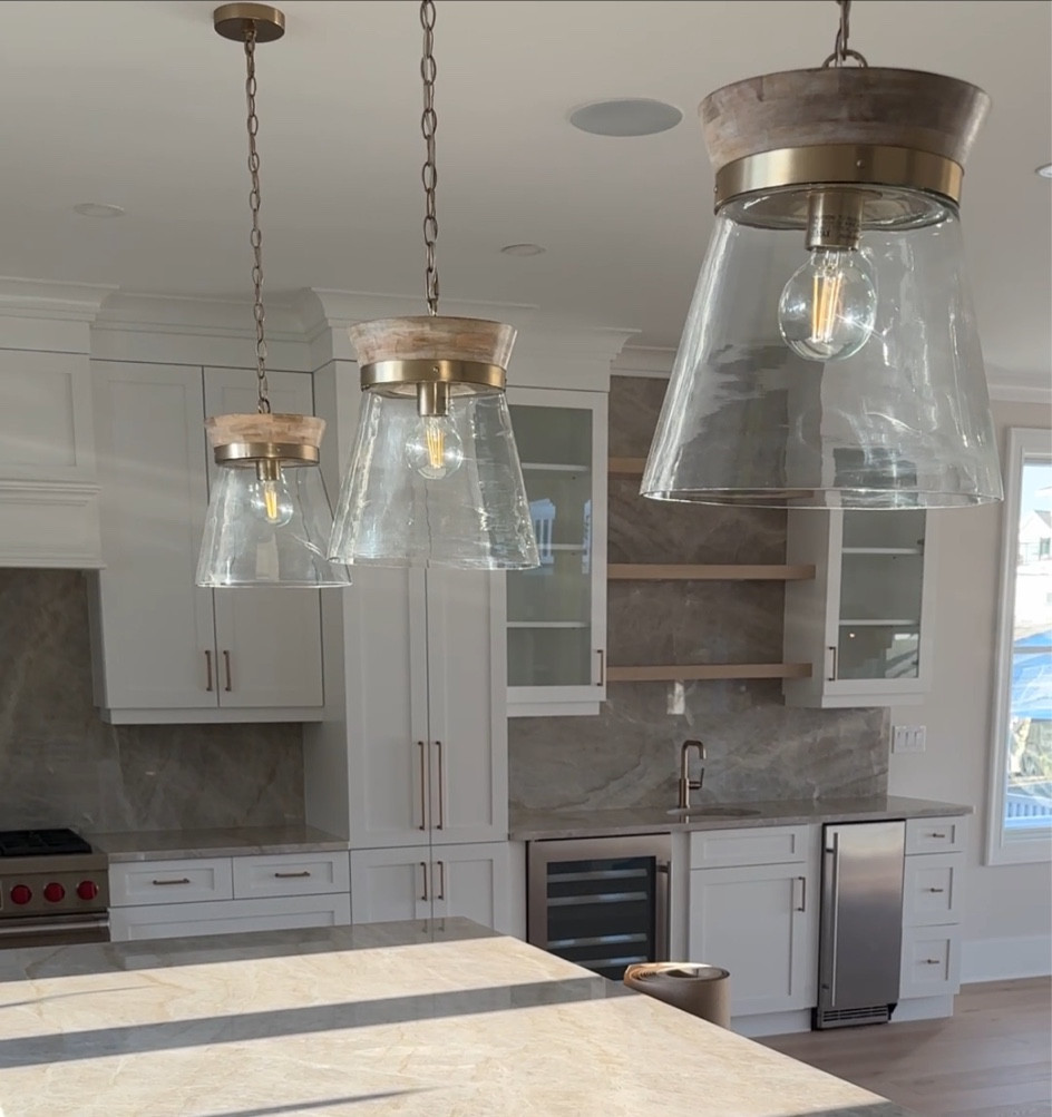 Kitchen island pendant lights for coastal home decor, boho home decor, coastal light fixture, Taj mahal quartzite, new kitchen, interior design 

#LTKhome #LTKSeasonal #LTKfamily