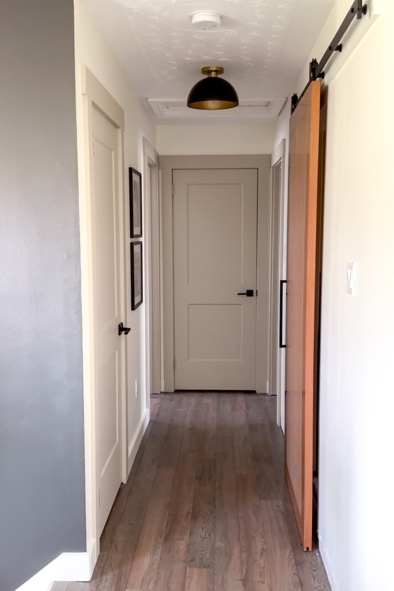Hallway makeover ✨
Barn door is from Home Depot Canada
Paint color of the walls- Dover White SW
Paint of the doors-Shiitake SW
Trim paint along floor- Alabaster SW 

Everything else linked #canada #homedecor #homerenovation #modernorganic #neutralhome

#LTKcanada
