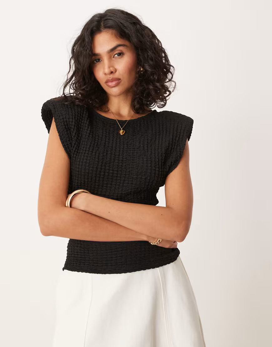 ASOS DESIGN shoulder pad bubble texture top in black | ASOS (Global)