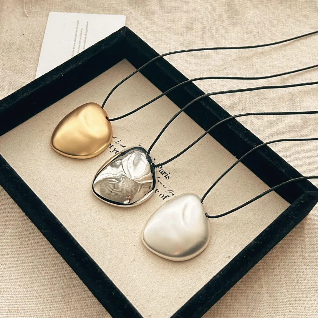 Sculptural Pebble Pendant Necklace: Gold or Silver Plated Copper, Adjustable Cord - Etsy | Etsy (US)