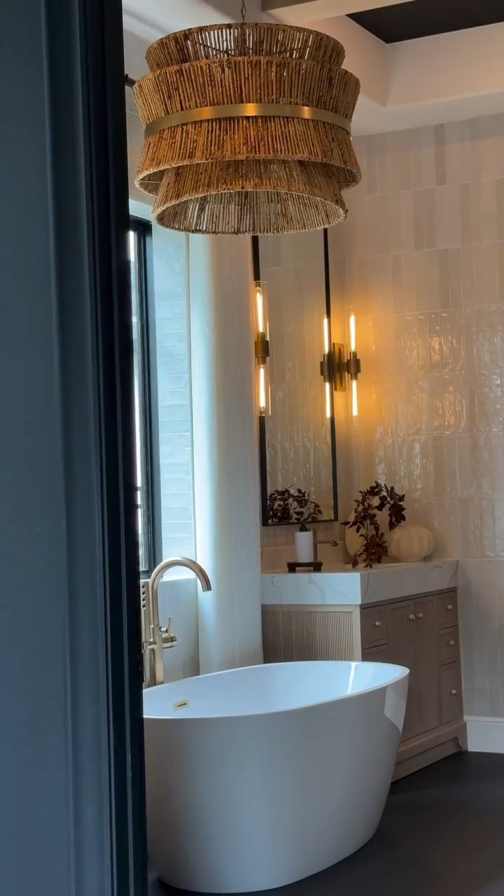 You can absolutely work with your builder grade framework to create a beautiful custom feel in your home. In this primary bathroom, I kept the original layout and framing, but updated the vanity, tub, flooring, and finishes to completely transform the space into something that feels elevated, warm, and much more personal.

Edit Inspo: @emm_interiors

#LTKSaleAlert #LTKHome