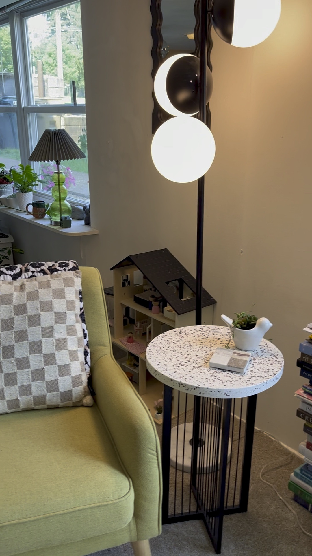 Small apartment tour! I love the floor globe lamp I got from Wayfair, terrazzo top side table, green side chair, boucle storage ottoman, coffee table books, cute dollhouse #livingroom #readingnook #homedecor

#LTKVideo #LTKHome #LTKSeasonal
