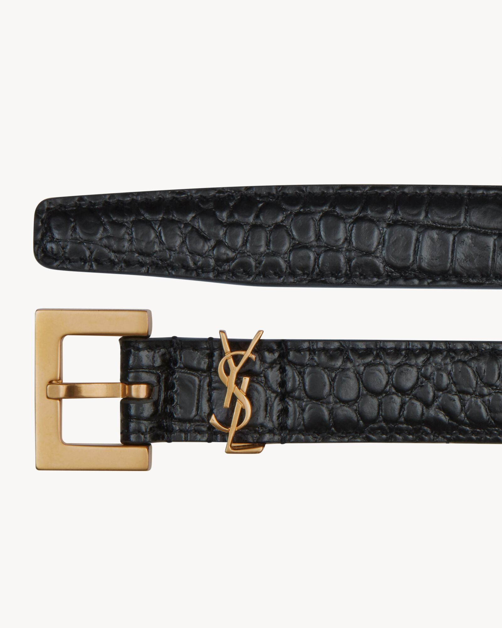 Narrow belt with square buckle featuring a Saint Laurent-Cassandre loop. | Saint Laurent Inc. (Global)