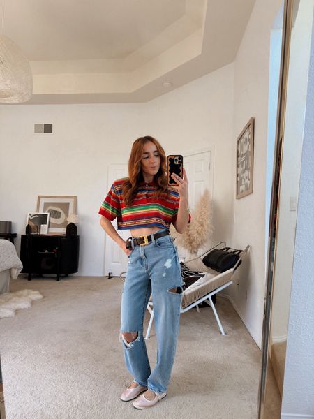 Make preppy style playful via a colorful stripe polo shirt, distressed denim and bright mary jane flat shoes.  


#LTKshoecrush #LTKstyletip #LTKHoliday